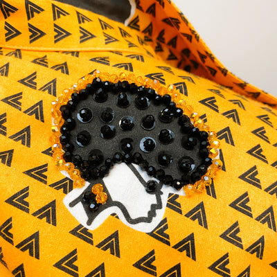Détail textile jaune et broderie de la collection Lou Aymé Artivago